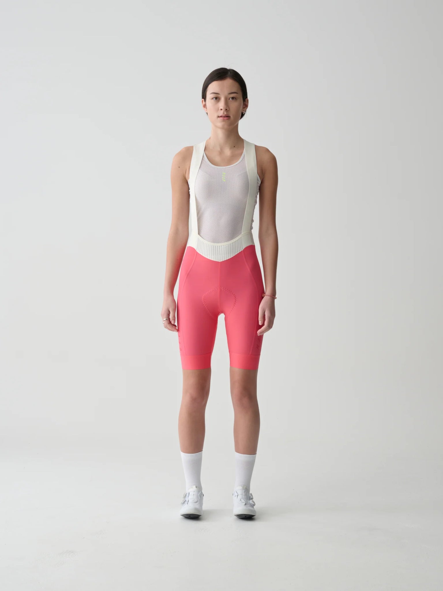 WOMEN´S SHORT TEAM BIB EVO - VIVID PINK